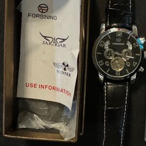 Forsining mens watch with black genuine leather band.wallets are sold separately